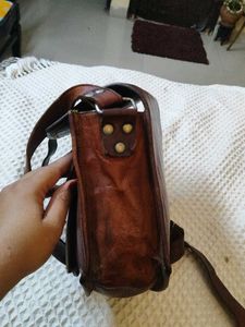 raw leather slingbag