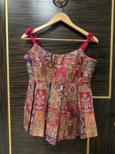 Peplum gathered upper with bell bottoms (check det