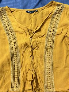 Yellow Top With Bell Sleeves And Tie Up