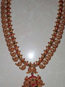 Elegant Gold-Toned Necklace with Red Stone Pendant