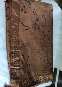 Elegant Brown Saree with stitched Blouse