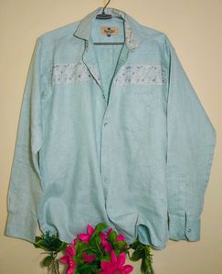 men's cyan coloured shirt