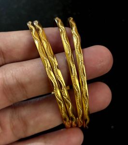 4 Gold Bangles