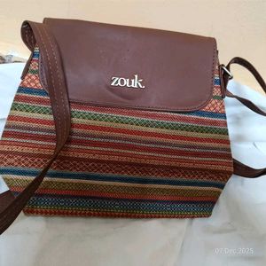 zouk brand new flap sling bag