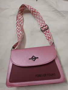Brand New, never used pink leather crossbody bag