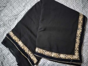 Elegant Black Saree with Gold Embroidery