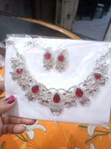 Silver Color Necklace With Imbeded Red Stone