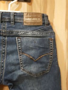 Ripped Blue Denim Jeans