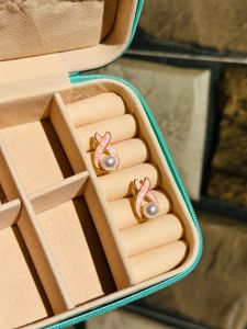 Elegant Pink swirl earrings with a Pearl touch 🤍✨