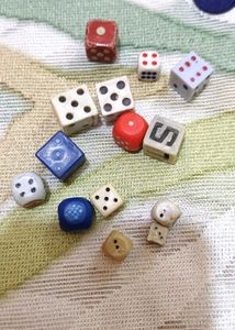 collection of dice n toy coins