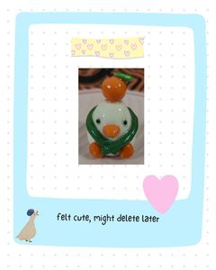 Duck Figurine with Orange