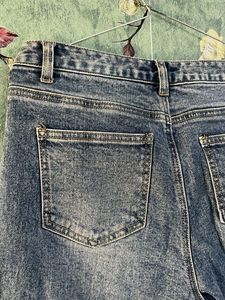 Distressed Wide Leg Denim Jeans