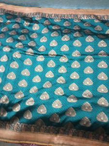 Embellished Banarasi Saree With Patterned Blouse.