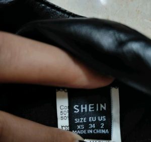 Chic Black Leather Skirt With Slit