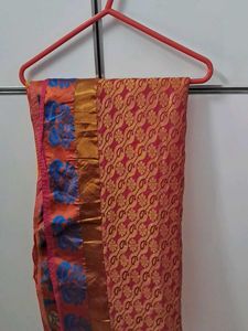 &#34;Vibrant Pink-Orange Kanjivaram Saree with Rich Go