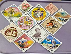11 DIAMOND SHAPED STAMPS