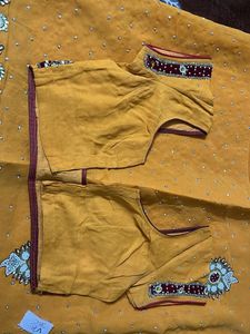 heavy work yellow red velvet border saree with blo