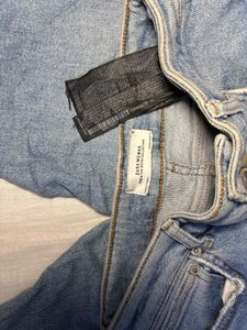 Ripped Knee Denim Jeans