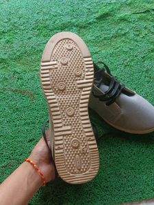 Man And Woman Sports Shoes