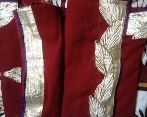 Elegant Maroon Saree with Silver Details