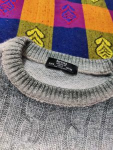 Stylish grey and white sweater