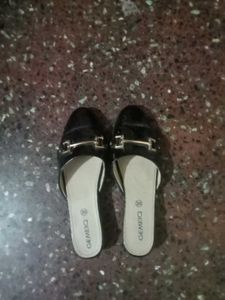 Black GEMEIQ Mules with Gold Accent