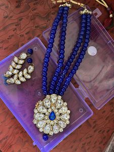 Blue beaded necklace and earring set