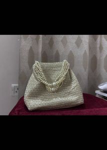 Elegant Gold Beaded Clutch