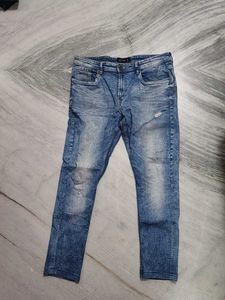 Distressed Wash Denim Jeans