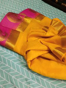 Yellow Saree With Pink Border
