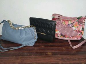 3 Handbags: black , sky blue, floral printed