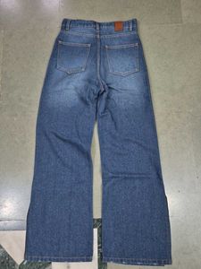 Blue Flared High Rise Mildy Distressed Jeans