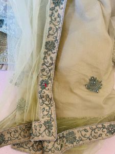 Pista Green Semi Stitched Lehenga