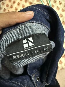 Denim Jacket with Ruffle Hem