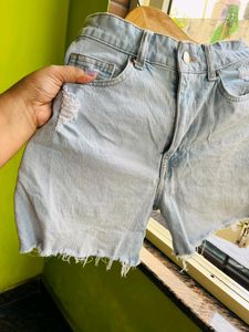 H&amp;M light blue washed ripped shorts