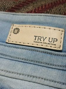 Ripped High-Waisted Jeans
