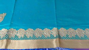 Teal Saree with Gold Embellishments