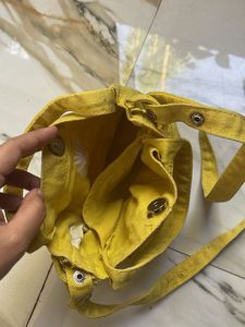 Yellow Sling Bag with Daisy