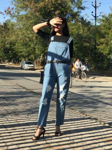 Denim dungaree with black top