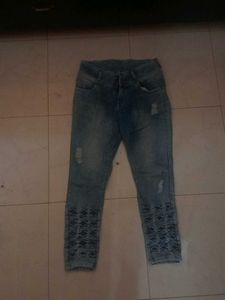 Distressed Denim Jeans with Cutout Detail