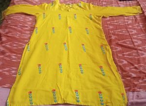 Yellow Colour Top With Nice Flower Design