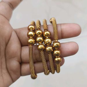 GOLDEN METAL LATKAN BANGLES WITH GHUNGROO