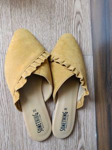 Black Heels And Yellow Flats