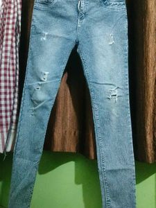 Ripped Blue Denim Jeans