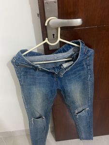 Ripped Knee Denim Jeans