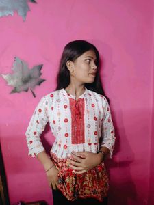 I'm Selling White Short Kurti...With An Preety Red