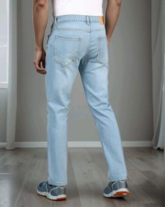Ripped Light Wash Denim Jeans