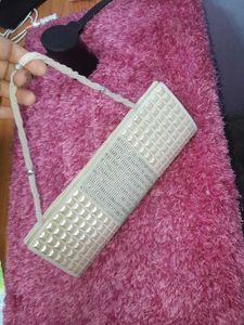 cream clutch bag