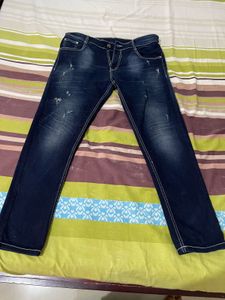 Distressed Denim Jeans