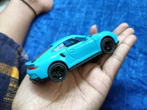 Teal Porsche Toy Car